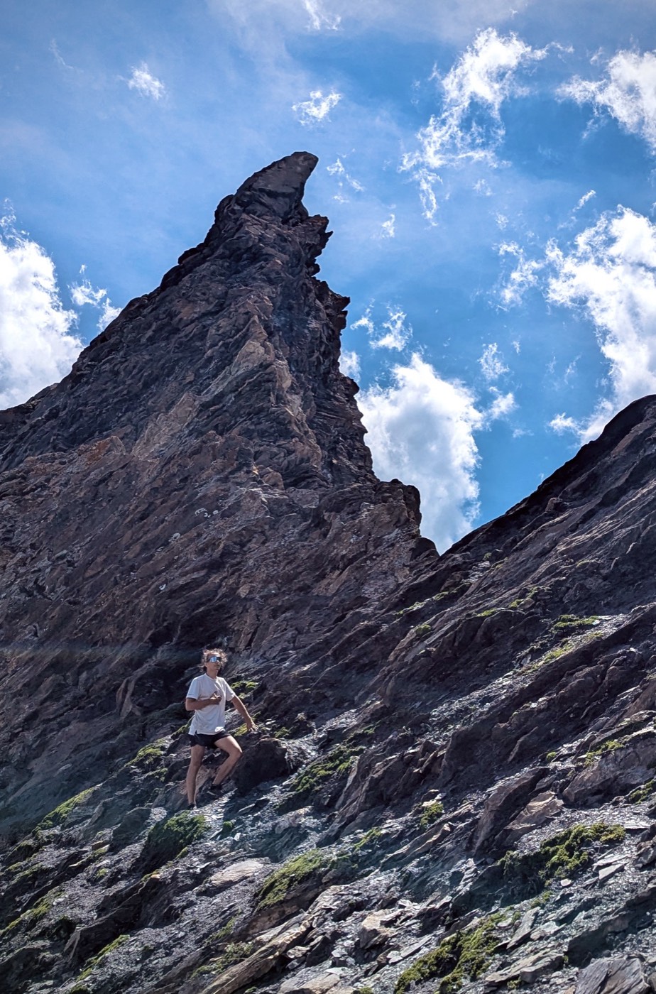 Flavio in the mountains, at the foot of a rocky ridge, in Savoie